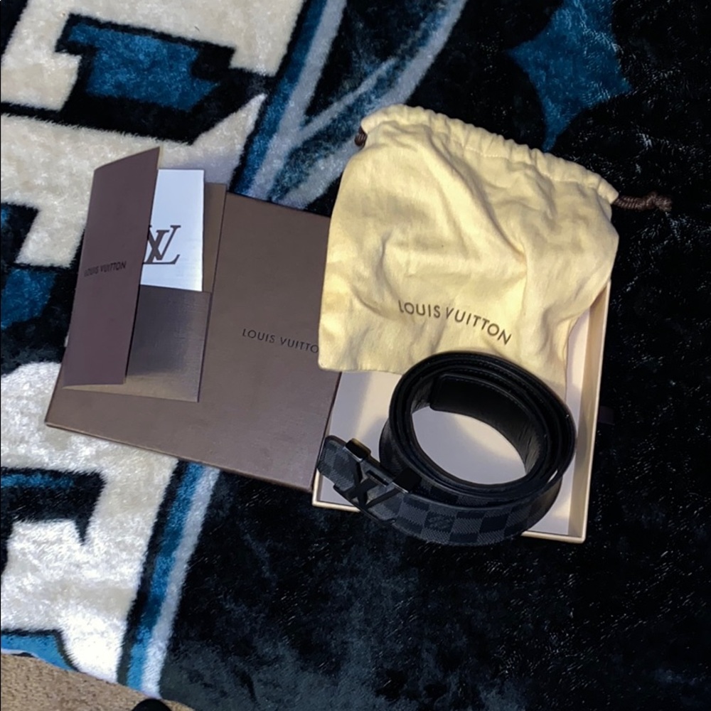 Louis Vuitton Black checkered belt.
